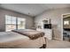 Main bedroom with king bed and access to a sitting area at 1811 Berkley Village Loop, Myrtle Beach, SC 29579