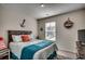 Cozy bedroom with a queen-size bed and decorative accents at 1811 Berkley Village Loop, Myrtle Beach, SC 29579