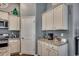 Kitchen with white cabinets, granite countertops, and stainless steel appliances at 1811 Berkley Village Loop, Myrtle Beach, SC 29579