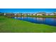 Stunning view of a peaceful pond with surrounding homes at 1811 Berkley Village Loop, Myrtle Beach, SC 29579