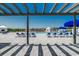 Resort-style pool with lounge chairs and a pergola at 1811 Berkley Village Loop, Myrtle Beach, SC 29579