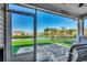 Relaxing screened porch overlooking a peaceful pond and golf course at 1811 Berkley Village Loop, Myrtle Beach, SC 29579