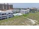 Aerial view of coastal condo complex with pool and beach access at 1820 N Ocean Blvd. # 102D, North Myrtle Beach, SC 29582