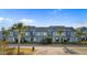 Two-story building with multiple units, featuring balconies and landscaping at 1851 Colony Dr. # 5E, Surfside Beach, SC 29575