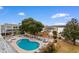 Community pool with surrounding lounge chairs at 1851 Colony Dr. # 5E, Surfside Beach, SC 29575