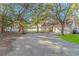 House and backyard with gravel driveway at 19 Springfield Rd., Pawleys Island, SC 29585