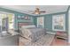 Spacious bedroom with a king-size bed and a ceiling fan at 19 Springfield Rd., Pawleys Island, SC 29585