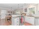 Modern kitchen with granite countertops, stainless steel appliances, and breakfast bar at 19 Springfield Rd., Pawleys Island, SC 29585