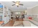 Open concept living area with hardwood floors and a fireplace at 19 Springfield Rd., Pawleys Island, SC 29585