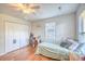 Bright bedroom with twin bed, desk, and hardwood floors at 1900 Allston St., Georgetown, SC 29440