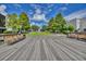 Wooden boardwalk with benches and trees in a town square at 1900 Allston St., Georgetown, SC 29440