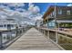 Boats docked at the waterfront with a wooden walkway at 1900 Allston St., Georgetown, SC 29440