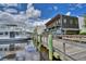 Wooden walkway along the river, with boats and a restaurant at 1900 Allston St., Georgetown, SC 29440