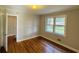 Hardwood floors and a view of the backyard from this bedroom at 1916 Calhoun St., Georgetown, SC 29440