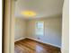 Well-lit bedroom featuring hardwood floors and a window at 1916 Calhoun St., Georgetown, SC 29440