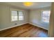 Bright bedroom with hardwood floors and large windows at 1916 Calhoun St., Georgetown, SC 29440