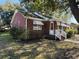 Brick house with a landscaped yard and white steps at 1916 Calhoun St., Georgetown, SC 29440