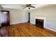 Hardwood floors, fireplace, and front door view at 1916 Calhoun St., Georgetown, SC 29440