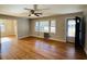 Hardwood floors, fireplace, and view to dining area at 1916 Calhoun St., Georgetown, SC 29440