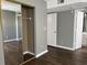 Bedroom with mirrored closet doors and wood-look flooring at 1925 Bent Grass Dr. # B, Surfside Beach, SC 29575