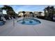 Relaxing community pool with surrounding patio furniture at 1925 Bent Grass Dr. # B, Surfside Beach, SC 29575