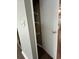 A narrow hall closet with wire shelving at 1925 Bent Grass Dr. # B, Surfside Beach, SC 29575