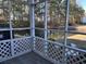 Screened porch overlooking a pond and wooded area at 1925 Bent Grass Dr. # B, Surfside Beach, SC 29575