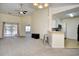 Spacious living room featuring carpet and dining area adjacent to the kitchen at 213 Wando River Rd. # 11-G, Myrtle Beach, SC 29579