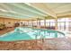 Indoor heated pool with large windows and seating area at 2401 S Ocean Blvd. # 363, Myrtle Beach, SC 29577
