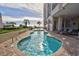 Inviting kidney-shaped pool with plenty of lounge chairs at 2401 S Ocean Blvd. # 363, Myrtle Beach, SC 29577