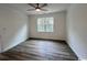 Bright bedroom featuring wood-look floors at 2509 Ye Olde Kings Hwy., North Myrtle Beach, SC 29582