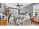 Spacious bedroom with a queen bed, workspace and large windows at 2560 Ellerbe Circle, Myrtle Beach, SC 29588