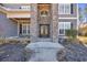 Elegant front entry with double doors and stone columns at 2560 Ellerbe Circle, Myrtle Beach, SC 29588