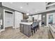 Modern kitchen with a large island, white cabinets, and stainless steel appliances at 2560 Ellerbe Circle, Myrtle Beach, SC 29588