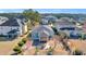 Aerial view of house with backyard patio and pergola at 274 Avenue Of The Palms, Myrtle Beach, SC 29579