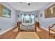 Main bedroom with a wooden bed and decorative accents at 274 Avenue Of The Palms, Myrtle Beach, SC 29579