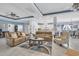 Bright and airy living room with two tan sofas and a view into the kitchen at 274 Avenue Of The Palms, Myrtle Beach, SC 29579