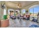 Relaxing sunroom with wicker furniture, offering tranquil views at 274 Avenue Of The Palms, Myrtle Beach, SC 29579