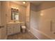 Clean bathroom with a tub, vanity, and tiled floors at 2958 Mary Hines Ln., Georgetown, SC 29440