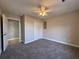 Spacious bedroom with gray carpet and double door closet at 2958 Mary Hines Ln., Georgetown, SC 29440