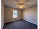 Bright bedroom with gray carpet and ceiling fan at 2958 Mary Hines Ln., Georgetown, SC 29440