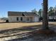 Back of house with a door and detached garage at 2958 Mary Hines Ln., Georgetown, SC 29440