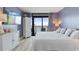 Ocean-view bedroom with king-size bed and private balcony at 3000 Ocean Blvd. N # 1905, Myrtle Beach, SC 29577