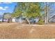 Backyard with view of house and trees at 3035 Dewberry Dr., Conway, SC 29527