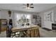 Bright dining room with water view and ample natural light at 3035 Dewberry Dr., Conway, SC 29527