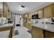 Well-equipped kitchen with ample cabinetry and counter space at 3035 Dewberry Dr., Conway, SC 29527