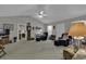 Living room with vaulted ceiling, neutral decor, and comfortable furniture at 3035 Dewberry Dr., Conway, SC 29527