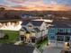 Stunning aerial view of waterfront home at sunset at 304 Spartina Ct., North Myrtle Beach, SC 29582