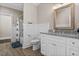 Clean bathroom with white cabinets, granite countertop, and a shower/tub combo at 304 Spartina Ct., North Myrtle Beach, SC 29582