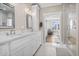 Double vanity bathroom with marble flooring at 304 Spartina Ct., North Myrtle Beach, SC 29582